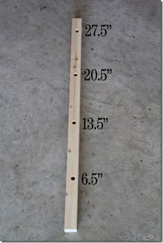 a ruler is on the floor with measurements