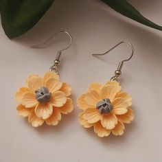 Stay fashionable this year with flower jewelry from US Fashion World  - Material: Earrings made from sterling steel hook, fashion resin. - Size: Orange flower earring 1.6x0.9 in. Lily flower 2.1x0.5 in. - Elegant and beautiful high quality earrings, perfect for any occasion. - Unique handmade earrings to make a statement. - Design adopts a combination of classical and modern styles. - Stylish to wear and make an ideal gift for Mom, sister, friends, family... We have our own fashion jewelry store Dangle Flower Earrings With 3d Flowers For Gifts, Gift Flower Dangle Earrings With 3d Flowers, Handmade Flower Shaped Earrings For Gifts, Handmade Flower-shaped Earrings For Gifts, Handmade Flower Shape Earrings For Gift, Handmade Flower Earrings As Gift, Adjustable 3d Flower Drop Earrings, Adjustable Handmade Flower Earrings, 3d Flower Earrings For Gift