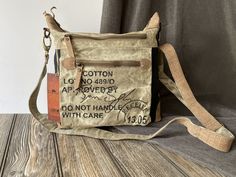 This vintage fashion messenger bag is handmade of an upcycled canvas. The trim is made of 100% genuine quality leather which is strong with a soft, natural, look and feel. Each bag is handcrafted with the spirit of vintage, ethnic, and bold style. The bag is sturdy and spacious, makes a great gift to your friend or family member you want to impress, and shows your unique taste and thoughtfulness. Constructed of canvas, this vintage-style tote is built for longevity and you are sure to get loads Artist Bag, Waxed Canvas Bag, Daily Bag, Tote Bags Sewing, Crossbody Messenger Bag, Boho Bags, Vintage Canvas, Canvas Handbags, Mini Purse