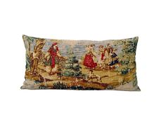 a decorative pillow with an image of people on it