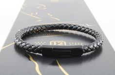 This bracelet is perfect for a modern, trendy man! Stylish and trendy for every occasion, this design is hand braided using leather. It is  great quality and is finished with a stainless steel secure locking clasp. The bracelet feels and looks very amazing on. And the best part...I can engrave a short name or date on the side, to make it the perfect, personalized gift! Choose from 3 sizes available (19cm, 21cm, 22cm) Details: ·Material: Faux Leather/polyurethane leather (looks and smells real)·C Modern Bracelets With Magnetic Closure As Gift, Modern Leather Bracelet With Magnetic Closure, Black Leather Bracelet With Magnetic Closure As Gift, Black Bracelets With Magnetic Closure As Gift, Elegant Black Leather Bracelet With Magnetic Closure, Valentine Gift For Dad, Personalized Leather Bracelet, Braided Leather Bracelet, Personalized Gifts For Mom