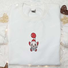 Baby Pennywise Embroidered Sweatshirt, Horror Movie Embroidered Hoodie, Halloween Embroidered Shirt Tinicloset is the embodiment of bespoke fashion, an enclave where self-expression is stitched into every garment. Within our boutique, an exquisite collection of custom embroidered apparel awaits, curated with meticulous attention to detail. From shirts to sweatshirts, T-shirts to hoodies, each piece is a... Cute Embroidered Long Sleeve Hoodie, White Custom Embroidered Top For Halloween, Cute White Embroidered Sweatshirt, Cute White Embroidered Hoodie, White Embroidered Sweater For Streetwear, White Hooded Top With Custom Embroidery, White Cotton Sweatshirt With Embroidered Patch, Cute Embroidered Crew Neck Hoodie, White Embroidered Graphics Hoodie