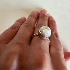 Silver Ring With White Pearl. Size 7. Brand New. Nickel Free White Round Ring, Modern White Crystal Ring For Anniversary, White Round Dome Ring For Anniversary, White Pearl Open Ring, White Oval Dome Ring For Wedding, Elegant White Adjustable Moonstone Ring, White Sterling Silver Open Crystal Ring, White Sterling Silver Crystal Open Ring, Classic White Moonstone Open Ring