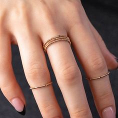 Exceptional in all circumstances, Heartstrings' Guitar String Ring is casual yet elegant, simple yet sophisticated. Single or stacked, this ring adds a touch of music to your fingers and a sparkle to your day!   The ring is composed of reclaimed acoustic, phosphor-bronze wrapped, guitar string. This ring is uncoated and will self-clean with wear or can be polished with a silver polishing cloth. Avoid chemical jewelry cleaning solutions. Also available in electric guitar string - https://www.etsy Guitar String Ring, Guitar Ring, String Ring, Guitar String Jewelry, Guitar String Bracelet, String Jewelry, Diy Guitar, Jewelry Cleaning Solution, Jewelry Cleaning