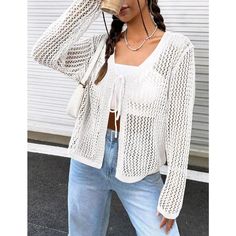 Elevate your summer style with the Women's Lightweight Crochet Cardigan by KOJOOIN. This exquisite tie-front shrug knit cardigan is the epitome of chic, combining crochet elegance with a breathable mesh design. Perfect for layering over your favorite outfits, it serves as an ideal beach cover-up or a stylish addition to your casual evening attire.

- **Material:** Crafted from a soft and lightweight blend of 89% Viscose and 11% Nylon.
- **Size:** Available in 2XL; fits US sizes 18-20.
- **Color: Beach V-neck Knitted Cardigan, White Casual Cardigan For Beach, Casual White Cardigan For Beach, White Casual Beach Cardigan, Casual White Beach Cardigan, Casual Open Front Beach Cardigan, Casual Open Front Cardigan For The Beach, White Winter Vacation Cardigan, Open Front Open Knit Cardigan For Vacation