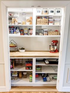 an open pantry with lots of food in it