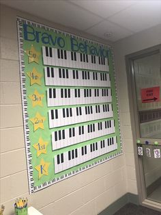 a bulletin board with piano keys on it