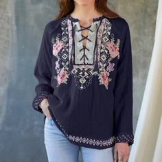 Description The Soft Cotton And Relaxed Silhouette Of Our Joanne Gauze Blouse Make It Seamlessly Comfortable, While Delicate Floral Embroidery And The Lace-Up Neckline Add A Touch Of Boho Flair. You're Sure To Love The Ethereal Elegance Of This Dreamy, Gauzy Top. Pair It With Your Favorite Denim Or Leggings And Sandals Or Flats For A Chic, Laid-Back Look. Product Details: Cotton Measurements For Size Medium: Length- 29", Bust- 23 3/4" Care Instructions: Hand Wash. Dry Flat Brand New With Tags Si Navy Long Sleeve Summer Top, Indigo Long Sleeve Bohemian Top, Navy Long Sleeve Blouse For Summer, Navy Long Sleeve Summer Blouse, Long Sleeve Indigo Tops With Floral Embroidery, Bohemian Indigo V-neck Top, Indigo V-neck Bohemian Tops, Indigo Long Sleeve Tops With Floral Embroidery, Indigo Bohemian V-neck Top