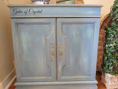 an old blue armoire painted with chalk paint