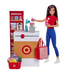 a doll is holding a shopping bag and standing next to a toy store display case