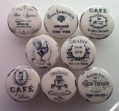 six white buttons with black and white designs on them, all depicting different types of food