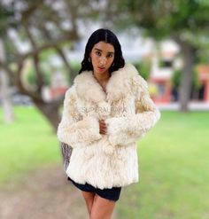 STUNNING UNISEX LIGHT BEIGE ALPACA FUR COAT Styled and glamorous Alpaca fur coat handmade of 100% genuine alpaca fur. Value for money is what every buyer seeks to achieve when buying any item. In the recent past, fur coats have gained popularity, and everyone wants to have as many of these as they can afford. Indeed, the coats are luxurious and investment because of many reasons. Size available: XS - S - M - L - XL XSMALL Bust: 88cm Shoulder: 38cm Length: 72cm Sleeve: 60cm SMALL Bust: 92cm Shoul Luxury Fluffy Long Sleeve Outerwear, Luxury Cream Fur Coat With Faux Fur Lining, Luxury Cream Fur Coat For Winter, White Sheepskin Fur Coat For Fall, Luxury Fluffy Winter Fur Coat, Luxury Fluffy Fur Coat For Winter, Luxury Faux Fur Winter White Outerwear, Luxury Winter White Long Sleeve Fur Coat, White Luxury Faux Fur Coat