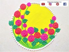 a yellow circle with pink and green flowers on it