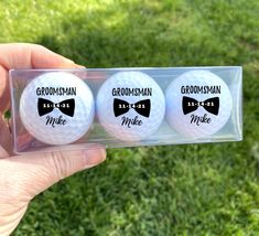 three golf balls with the words best man and steve on them