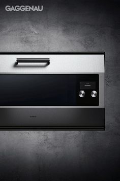 a black and white photo of a stove top oven with the words gaggenau on it