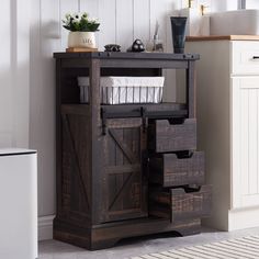 PRICES MAY VARY. [CUSTOMIZED STORAGE SPACE] 23.5"L × 12"W × 32"H, Utilize the tabletop to store cleaning supplies of any height, open shelf and three storage drawers for small items. Also sliding barn door and adjustable shelf to suit your storage needs, creating an orderly life space without mess not only in bathroom [FARMHOUSE RUSTIC STYLE] Crafted from high-quality engineered wood, our storage cabinet is designed with classic barn door, double cross pattern and weathered finish that gives a charming rustic feel. Redecorate the whole space with elegant metal decorations to add more deeper farmhouse touch for it [STURDY SUPPORT] Comes with one sturdy support base and tipping restraint hardware, so you could fix this small cabinet to the wall and prevent it from wobbling or tipping over. A Barn Door Double, Store Cleaning Supplies, Barn Door Storage, Storing Cleaning Supplies, Cabinet For Bathroom, Farmhouse Storage Cabinets, Bathroom Floor Storage Cabinet, Bathroom Floor Cabinet, Small Storage Cabinet