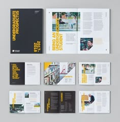 an assortment of brochures are displayed on a gray surface with yellow and black lettering