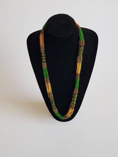 *This listing is for ALL 5 mecklaces like shown above* 100% handcrafted using original fine beads. The necklace makes a perfect gift to loved ones. **Buy multiple items and pay shipping for 1 item only.The rest ships free. Custom orders are welcome. More neckleces here; https://www.etsy.com/shop/TribalTess?ref=seller-platform-mcnav&section_id=21306083 Back to my shop; https://www.etsy.com/shop/TribalTess?ref=seller-platform-mcnav Multi-strand Beaded Chain Necklace Gift, Handmade Multi-strand Necklaces For Wedding, Unique Multi-strand Necklace For Gift, Green Multi-strand Beads For Gifts, Elegant Multicolor Necklace With Tiny Beads, Handmade Bohemian Green Bridal Necklace, Handmade Green Bohemian Bridal Necklace, Bohemian Bridal Necklace With Round Beads As Gift, Bohemian Handmade Green Bridal Necklace