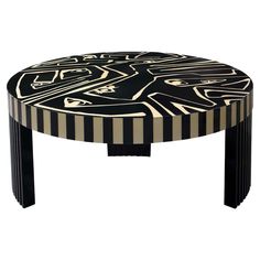 a black and white coffee table with designs on it