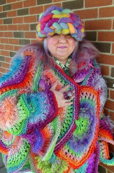 Funky Long Sleeve Winter Outerwear, Funky Long Sleeve Outerwear For Fall, Colorful Hand Knitted Fall Outerwear, Colorful Knitted Outerwear For Winter, One Size Multicolor Knit Outerwear, Funky Multicolor Winter Outerwear, Funky Multicolor Fall Outerwear, Colorful Crochet Outerwear For Winter, Rainbow Peacock