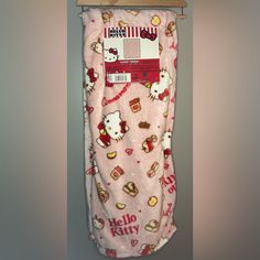 hello kitty baby swaddle hanging on the wall