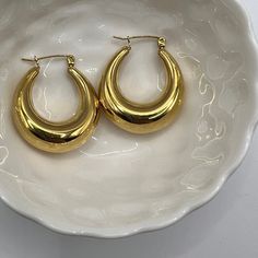 18K Gold Hoops, Gold Basic Staple Hoops, Waterproof Tarnish Resistant Hoops, Statement Jewellery, Party Hoops, Beach Jewellery Material:     - Hypoallergenic  - Waterproof  - Non-Tarnish -High-Quality Gold Plating Measurement: 7 man x 25 mm  How to Care for your Jewellery so they will last longer:  - Wipe the jewellery clean every time after wearing  - Store gold jewellery separate from other jewellery  - Keep jewellery away from harsh chemicals, particularly bleach. - PVD gold plated items are Hoops Aesthetic, Beach Jewellery, Hoops Silver, Hoops Gold, Wear Store, Statement Jewellery, Keep Jewelry, Gold Hoops, Jewelry Earrings Hoops