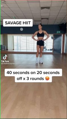 a woman standing in an empty room with her hands on her hips and the caption says, savage hit 40 seconds on 20 seconds off x 3 rounds