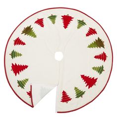 a round christmas tree skirt with red, green and white trees on the bottom half