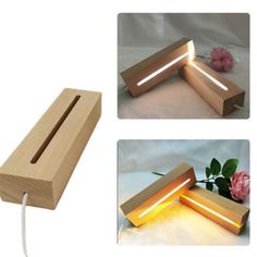 a wooden light that is sitting on top of a table with flowers in the background