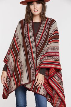 Inspired by the rich culture and ancient Incan ruins of Cusco, Peru, the Maya cape adds traditional South American flavor and a pop of color to your cool-weather wardrobe. This graceful, draping layer made from 100% baby alpaca wool is wonderfully soft, and insulates you from the cold without being heavy. Throw on this easy-wear cape over your favorite tee and jeans for an effortlessly stylish, timeless look. Lambskin Leather Blazer, Peruvian Textiles, Cashmere Cape, Cusco Peru, High Fashion Outfits, Leather Jacket Style, Wool Cape, Wool Wrap, Mexican Dresses