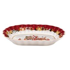 a white bowl with red trim and christmas decorations on it, sitting in front of a white background