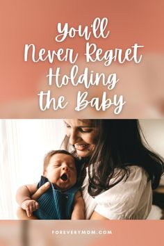 a woman holding her baby in her arms with the words, you'll never regt holding the baby