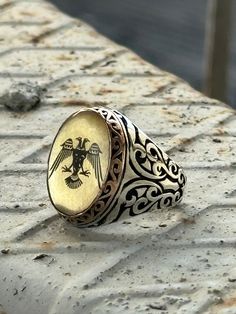 Man Handmade  Eagle Ottoman Ring , Silver Eagle Ring , Double Headed Eagle Ring , Solid 925k Sterling Silver Men For Gifts ★Item Details * Gender : Male / Female * Material : 925K Sterling Silver * Total weight : 16 Grams ✔ Ready to Ship in 1-2 Business Days .. ✔ Shipped to the Worldwide 1-5 business days with free shipping... ✔ The product will be sent to you with a handmade wooden box to avoid any damage during shipping... ✔ Visit our store, browse other Men's jewelry, silver and gold collecti Traditional Sterling Silver Signet Ring, Traditional Sterling Silver Round Signet Ring, Ceremonial Silver Engraved Ring Stamped 14k, Ceremonial Silver Engraved Ring, Stamped 14k, Handmade Sterling Silver Signet Ring For Ceremonial Use, Handmade Sterling Silver Signet Ring For Ceremonial Occasions, Ceremonial Oval Sterling Silver Engraved Ring, Ceremonial Oval Engraved Sterling Silver Ring, Oval Engraved Sterling Silver Ring For Ceremonial Occasions