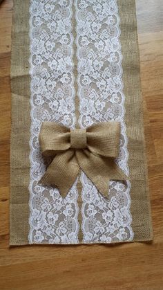 the table runner has a bow on it