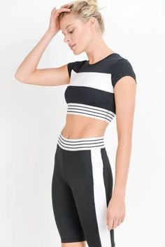 Be a black and white delight in this active crop top and active shorts! This sporty number is perfect for more coverage than your average sports bra. It features a wide white stripe on the front, tight cap sleeves, and striped rib band. Constructed using polyester-spandex and flattering wide side panels, back pocket with white details, side pockets (perfect size for your phone), and striped elasticized waist band, these shorts are the perfect alternative to leggings. If you want to purchase sepa Biker Short Set, Active Top, Biker Short, Women Bags Fashion, Active Shorts, Short Set, Womens Casual Outfits, Biker Shorts, Black Crop Tops