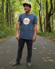 Show off your Pacific Northwest pride everywhere you go. Whether you're looking for your new favorite hiking shirt or something to wear when you're not in the woods, our PNW Solid Script tee shirt is that shirt. This design captures the vibes of the beautiful Pacific Northwest. These shirts are made by hand using a heat pressing process. Details: - 52% Cotton / 48% Polyester - Seamless torso for snug, appealing, and Unisex fit for men and women. - Double Needle Bottom Hem & Sleeves - Shoulde Vintage Cotton Tops For Outdoor Activities, Vintage Cotton T-shirt For Outdoor Activities, Vintage Tops With Letter Print For Outdoor Activities, Vintage Letter Print Tops For Outdoor Activities, Retro Cotton Tops For Outdoor, Blue Vintage Tops For Outdoor, Retro Cotton T-shirt For Outdoor Activities, Vintage Pre-shrunk Tops For Outdoor Activities, Pre-shrunk Vintage Tops For Outdoor Activities