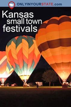 several hot air balloons are lit up in the night sky with text that reads kansas small town festivals