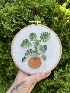 a hand holding an embroidery of a monstera plant that has 3-dimensional leaves. Thread Painting Embroidery, Stumpwork Embroidery, Stump Work, Plant Embroidery, Colorful Plant, Semi Realistic, Fabric Pen, Monstera Plant