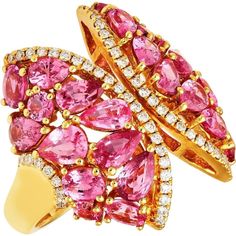 Cherish the timeless appeal of the Tidal Ring in Pink Sapphire, a masterpiece that encapsulates elegance and sophistication. Adorned with beautiful pink sapphires, each delicately trimmed with glistening diamonds, this ring boasts a fashionable fan-shaped setting that exudes grace and style. As you slip this exquisite piece onto your finger, you'll feel the allure of its 4.76 carats of pink sapphire, radiating with feminine charm, complemented by the sparkle of 0.31 carats of dazzling diamonds.Let this Tidal Ring be a symbol of your individuality and refined taste, a statement piece that effortlessly transitions from day to night, elevating any ensemble with its sheer beauty and allure. Whether worn as a bold cocktail ring or a chic everyday accessory, this piece is sure to turn heads and Luxury Pink Sapphire Diamond Ring With Gemstone, Elegant Multi-stone Pink Sapphire Diamond Ring, Luxury Pink Ruby Ring For Formal Occasions, Luxury Pink Sapphire Ring With Pave Setting, Luxury Pink Sapphire Ring For Formal Occasions, Pink Sapphire Ring With Pave Setting, Luxury Pink Sapphire Ring With Rose Cut Diamonds, Luxury Pink Ruby Diamond Ring, Luxury Pink Ruby Ring With Diamond