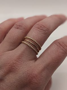 Beaded 14k gold filled ring.  This ring is perfect for everyday wear and a great stacking ring. Classic 14k Gold Filled Stackable Rings, Dainty Stackable Jewelry, Dainty Inelastic Stackable Jewelry, Classic Stackable 14k Gold Filled Midi Rings, Tiny Gold Stackable Rings In 14k Gold Filled, 14k Gold-filled Stackable Midi Rings With Open Shape, Dainty Gold Open Ring Band, 14k Gold Filled Stackable Midi Open Rings, Stackable Midi Open Rings In 14k Gold Filled