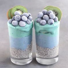 two glasses filled with blue and green desserts