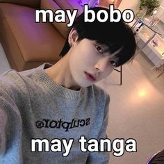 a person sitting on a couch with a laptop in front of them and the caption says, may bobo may tanga