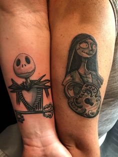 two people with matching tattoos on their arms, one has a skeleton and the other has a