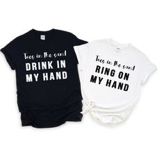 two t - shirts with the words'free as me and drink in my hand'printed on them