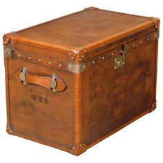 an old leather trunk is shown on a white background