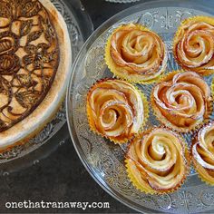 there are many pastries on the plate and one has been made to look like roses