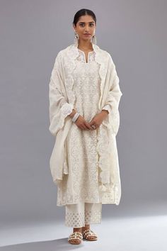 Buy Off White Kurta And Dupatta Floral & Sequins Straight Pant Set For Women by KORA Online at Aza Fashions. Semi-stitched White Unstitched Suit With Naqshi, Festive White Salwar Kameez With Naqshi, Designer White Salwar Kameez With Naqshi Detailing, Designer White Salwar Kameez With Naqshi, Designer White Naqshi Salwar Kameez, White Salwar Kameez With Naqshi For Eid, White Naqshi Salwar Kameez For Eid, White Anarkali With Naqshi Detailing, White Naqshi Anarkali Set For Wedding