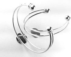 TYPE: Adjustable Bracelet Cuff w/ 18mm Blank Flat Pad For Gluing On Adornments SIZE: Adjustable,18mm (3/4inch) Bezel Setting MATERIAL: Nickel Free, Lead Free, Alloy Metal COLOR: Silver Plated QUANTITY: 2pcs For more BRACELET supplies, CLICK HERE! https://www.etsy.com/shop/MoonLightSupplies?ref=hdr_shop_menu&search_query=bracelet For more BLANK supplies, CLICK HERE! https://www.etsy.com/shop/MoonLightSupplies?ref=hdr_shop_menu&search_query=blank THANK YOU FOR SHOPPING MOONLIGHT SUPPLIES! Silver Metal Bracelet With Adjustable Band, Silver Adjustable Band Bracelet As Gift, Silver Adjustable Band Bracelet For Gift, Adjustable Silver Cuff Bracelet, Nickel-free Silver Cuff Bracelet, Silver Round Cuff Bracelet, Adjustable Round Cuff Bracelet, Bracelet Supplies, Bangle Diy