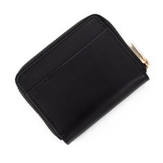 Timeless Chic in a Compact Package: The Mini Black Leather Zip Wallet This small zip-around wallet in smooth black leather is the epitome of classic style. Crafted from high-quality leather, it offers a touch of luxury that complements any outfit. Here's why you'll love it: The secure zip closure keeps your essentials safe and sound. Multiple card slots make organizing your credit cards, IDs, and loyalty cards simple. Compact size slips easily into any bag or pocket, perfect for daily use. A con Black Leather Wallet, Loyalty Card, Mini Wallet, Zip Wallet, High Quality Leather, Wallets For Women, Zip Around Wallet, Leather Wallet, Classic Style