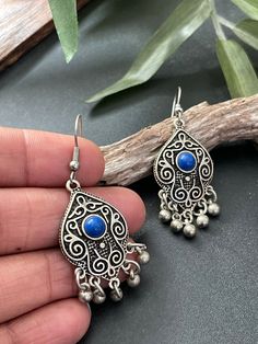 Indus Earrings : Back to our Roots. For the women who makes a statement.  An exclusive shop for earrings. Wear them with pride.  These are dangling drops style earrings . An unique handmade Indian style ethnic bohemian/ Tribal earrings in silver shade with blue enamelled .  These earrings are made from high quality Tatanium / German silver material  which are hypoallergenic and free from corrosion & rusting. An uniquely crafted dangling drops earrings in blue  Notes : The product shipped will be Teardrop Chandelier Earrings For Festival, Nickel-free Bohemian Chandelier Earrings, Blue Metal Earrings With Latkans, Bohemian Drop Earrings, Traditional Nickel-free Teardrop Earrings, Traditional Nickel-free Drop Earrings, Bohemian Teardrop Danglers For Gifts, Bohemian Dangling Beads Drop Earrings, Bohemian Teardrop Plug Earrings